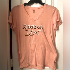 Reebok short sleeve shirt, V neck, light pink, size XL. Cotton, used.